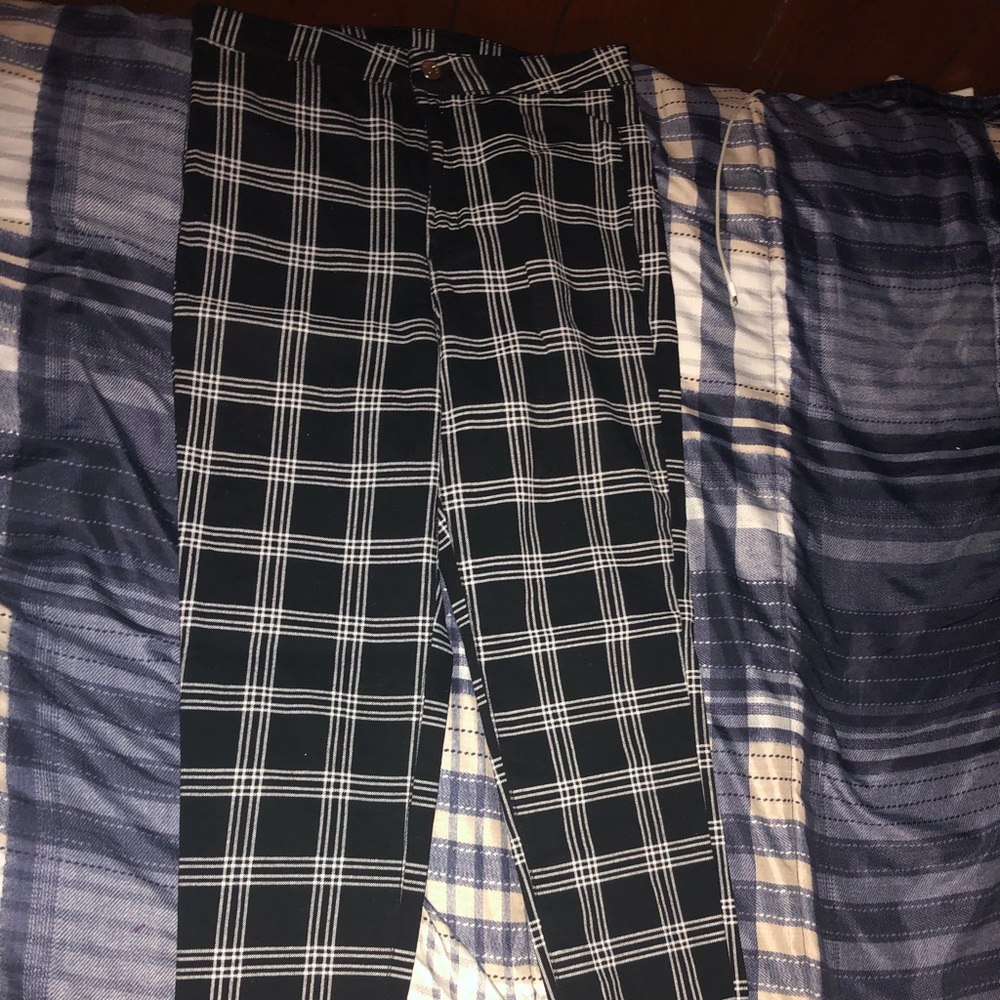 Divided striped pants with frayed bottoms